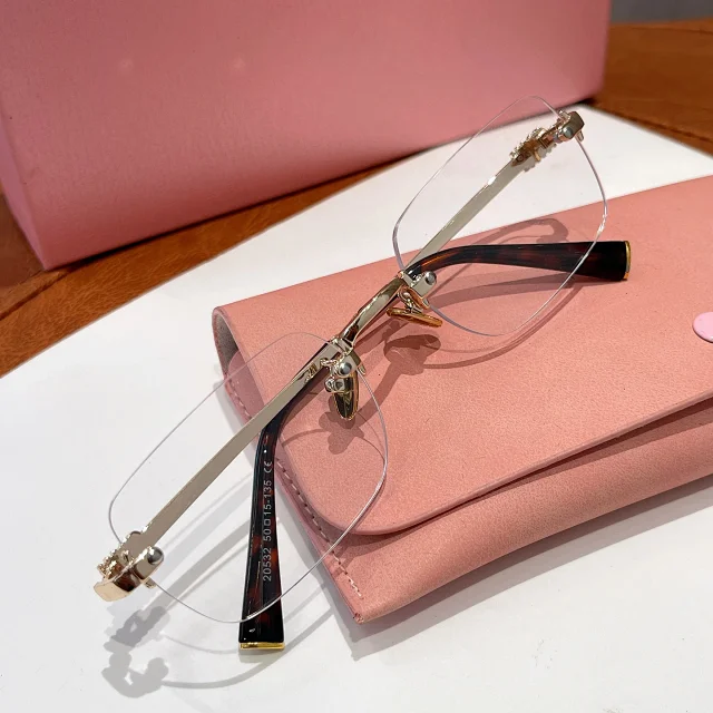 Miu Eyewear Rimless rectangular sunglasses product detail image 6