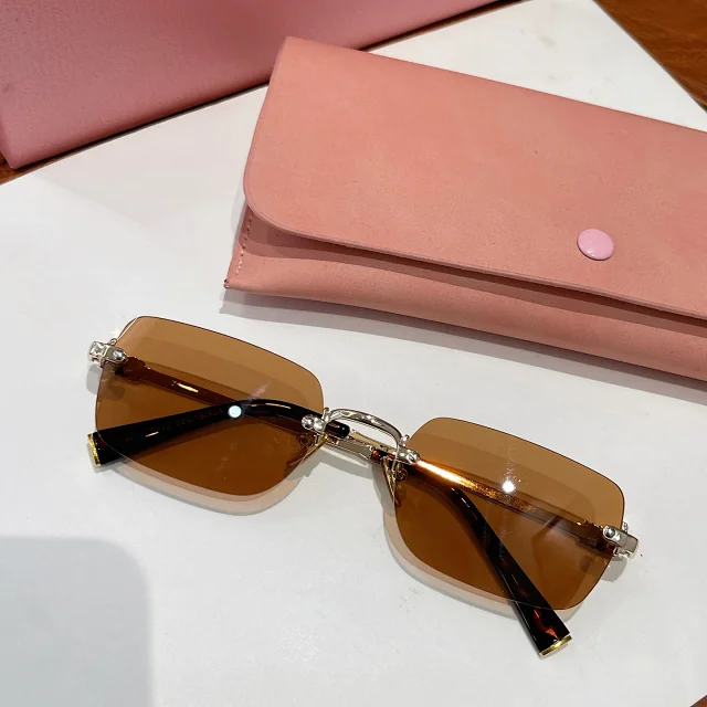 Miu Eyewear Rimless rectangular sunglasses product detail image 13