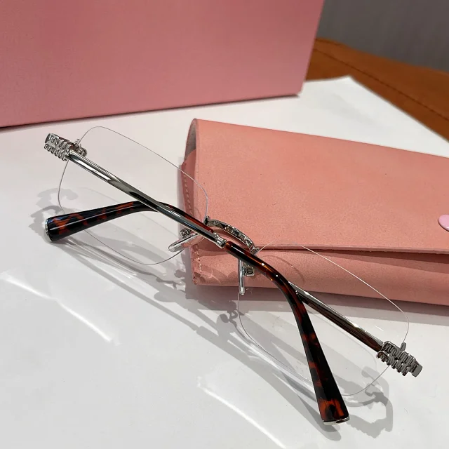 Miu Eyewear Rimless rectangular sunglasses product detail image 20