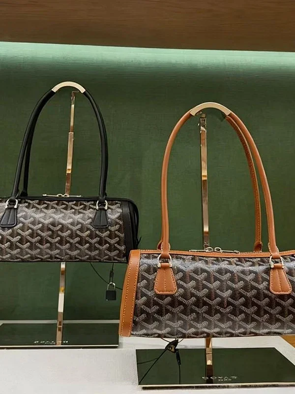 Unbranded Handbags Cylindrical baguette handbag with chevron pattern product detail image 1