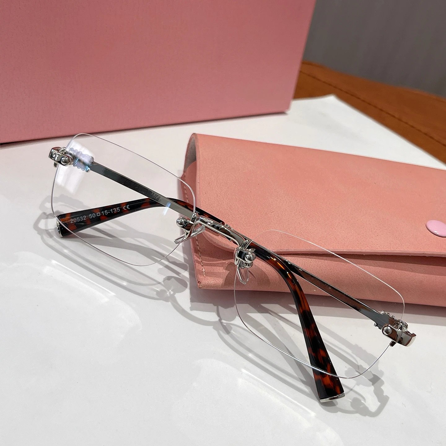 Miu Eyewear Rimless rectangular sunglasses — Silver Flat Light