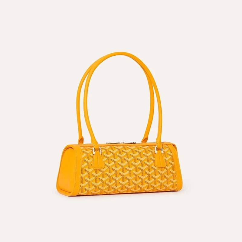 Unbranded Handbags Cylindrical baguette handbag with chevron pattern — Yellow