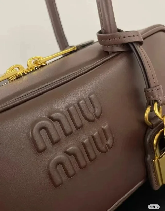 Miu Handbags Long-Handle Bowling Bag with Padlock Charms product detail image 15