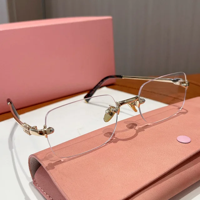 Miu Eyewear Rimless rectangular sunglasses product detail image 3