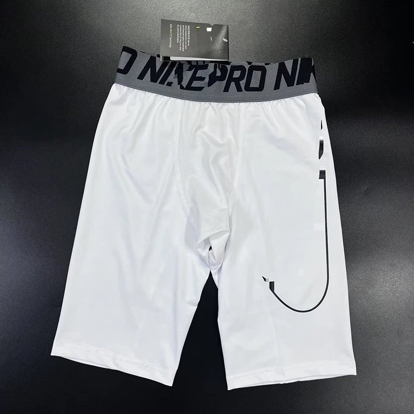 Nike Dri-FIT sleeveless compression tank top — X7 tight leggings shorts with a large logo
