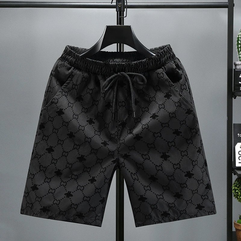 Versace Shorts Elastic-waist drawstring all-over logo-print — 6 K 71 bee