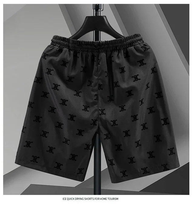 Versace Shorts Elastic-waist drawstring all-over logo-print product detail image 7