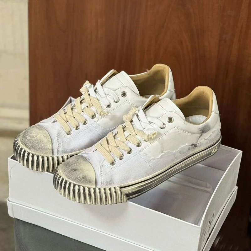 Maison Margiela Sneakers Evolution low-top canvas — White dirty shoes