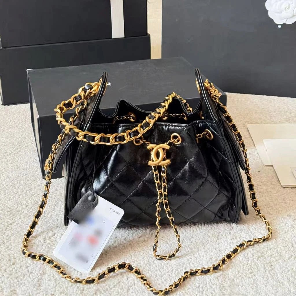 Chanel Shoulder Bags Quilted drawstring chain bag — Mini black (oil wax skin)
