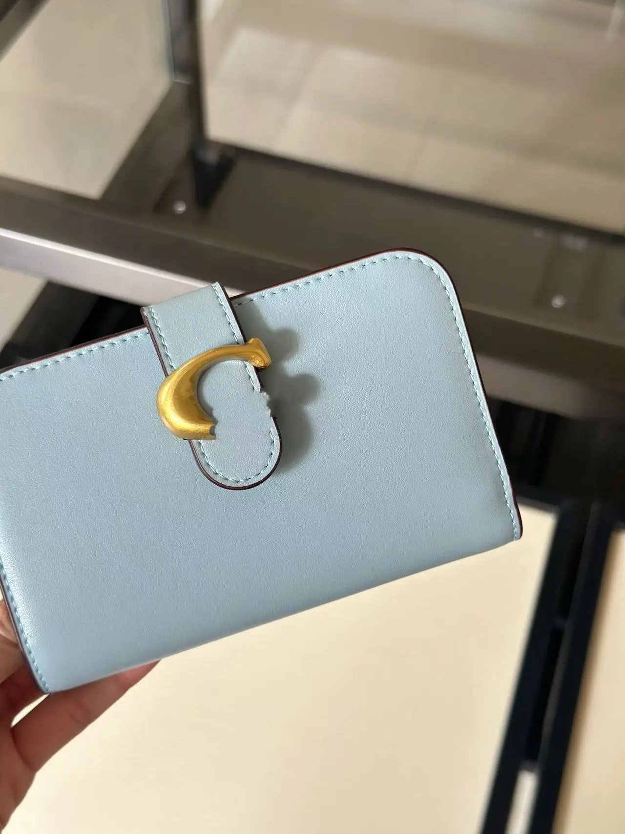 Unbranded Wallets & Card Holders Compact wallet with gold-tone C-shaped buckle — Light blue