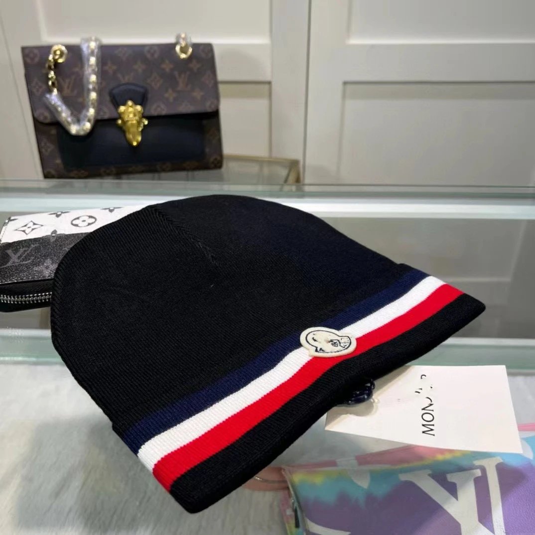 Moncler Hats Knitted beanie with tricolor stripe and logo patch — Black