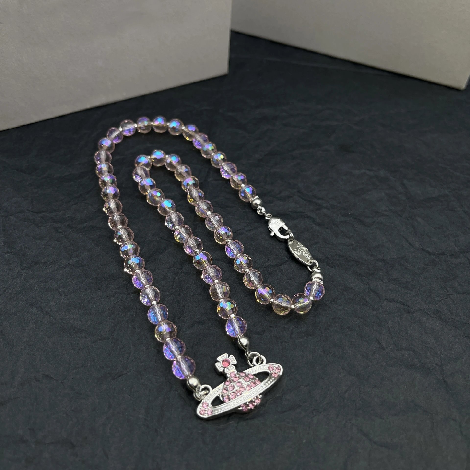 Unbranded Jewelry Orb and Cross Pendant Necklace — Pink Crystal Saturn Necklace