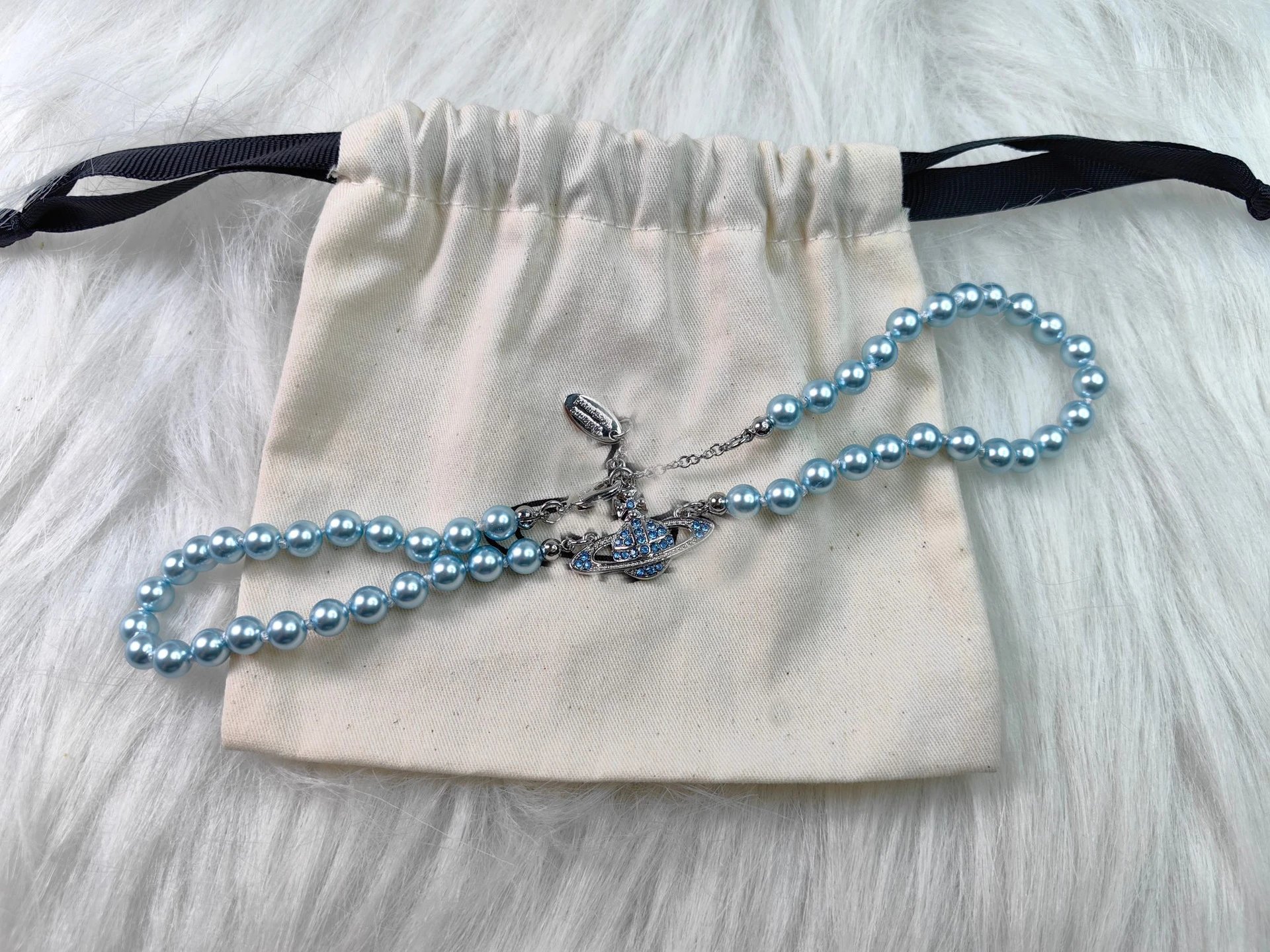 Unbranded Jewelry Orb and Cross Pendant Necklace — Pearl Saturn Necklace (Silver with Blue Beads)