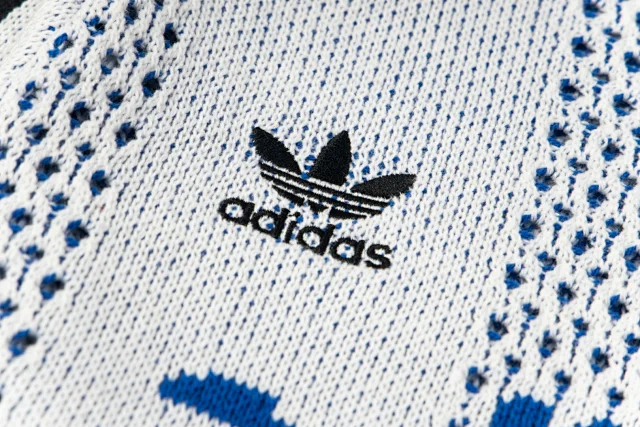 Adidas Knitwear Crew-neck knit sweater with three-stripe sleeves and logo graphic product detail image 8