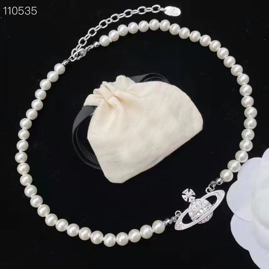 Unbranded Jewelry Orb and Cross Pendant Necklace — Pearl Saturn necklace (silver) with a chain tail