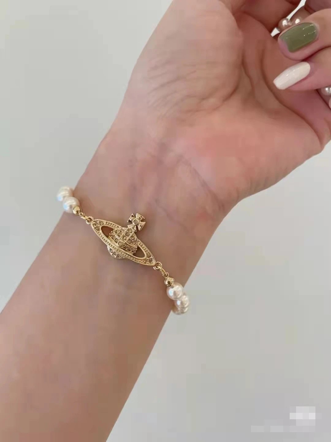 Unbranded Jewelry Orb and Cross Pendant Necklace — Pearl Saturn Bracelet (Gold)