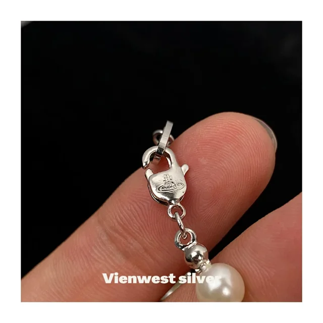 Unbranded Jewelry Orb and Cross Pendant Necklace product detail image 6