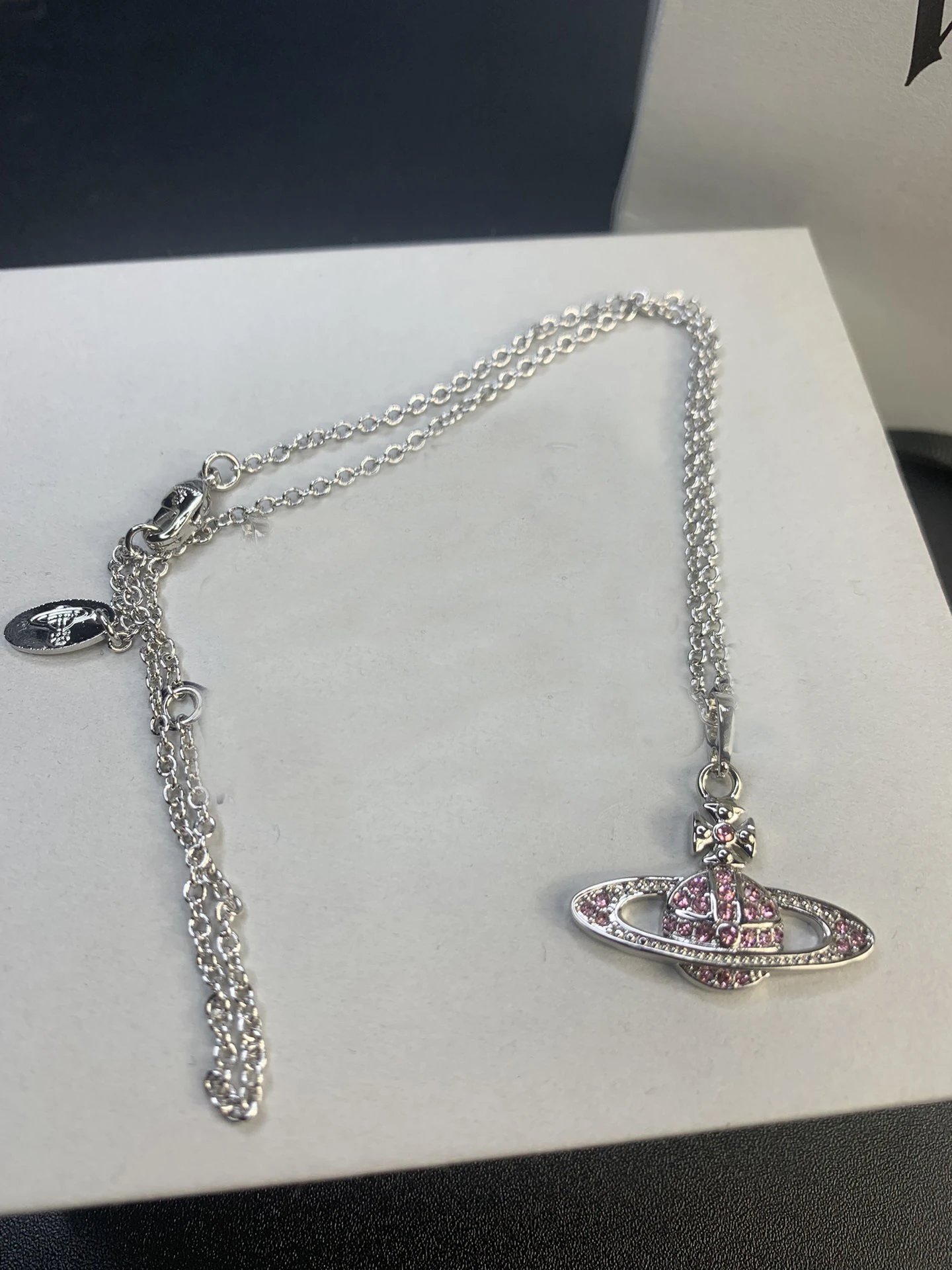 Unbranded Jewelry Orb and Cross Pendant Necklace — Saturn Necklace (Silver with Pink Diamonds)