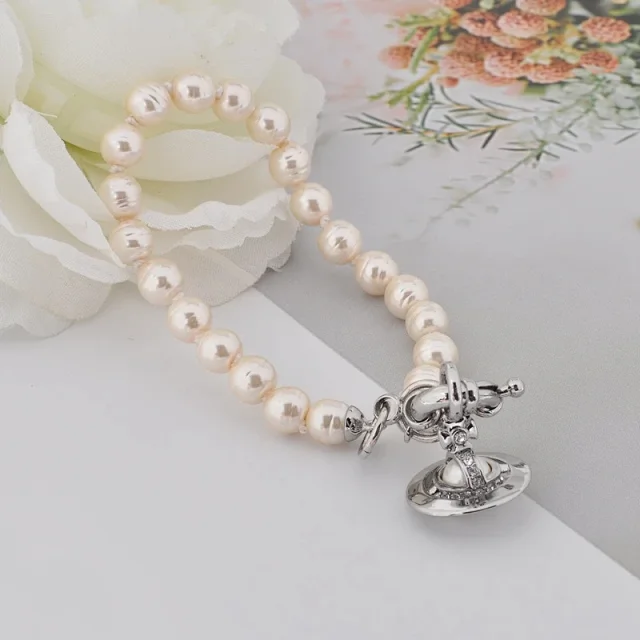 Vivienne Westwood Jewelry Pearl Orb Necklace and Bracelet product detail image 1