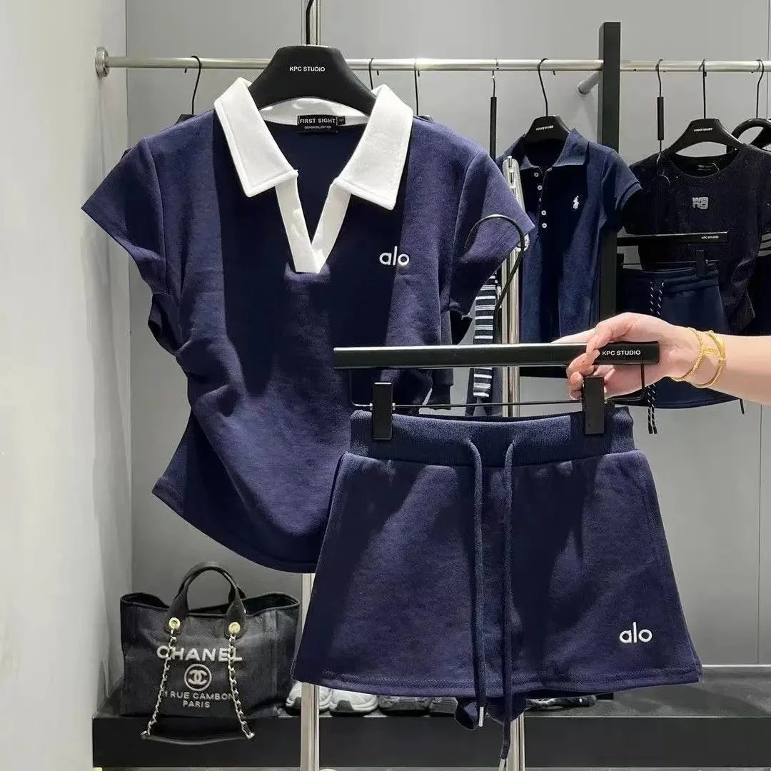 Alo Matching Sets Short-sleeve collared top and drawstring shorts set — Blue suit