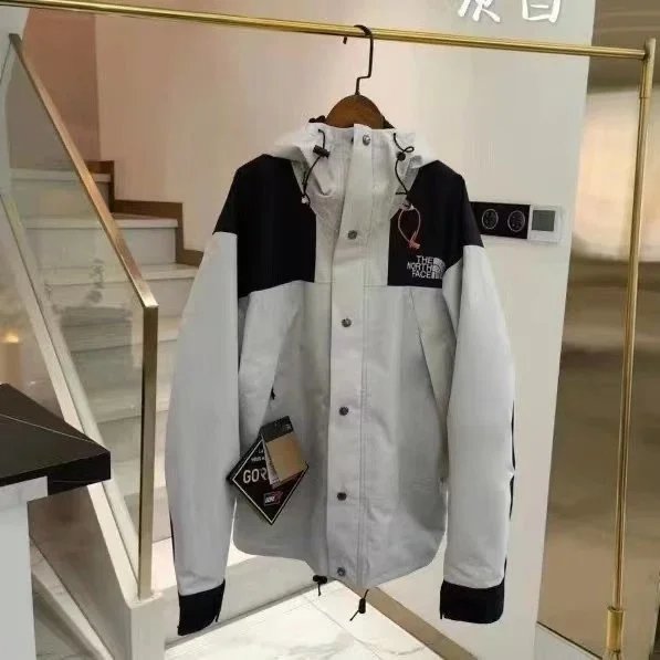 Nike Jackets Hooded color-block windbreaker jacket — TNF-grayish white