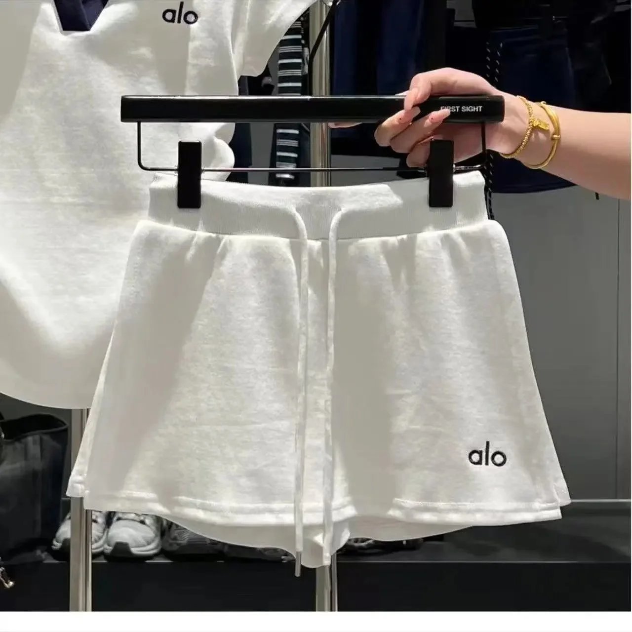 Alo Matching Sets Short-sleeve collared top and drawstring shorts set — White shorts