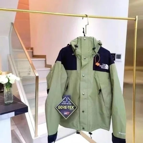 Nike Jackets Hooded color-block windbreaker jacket — TNF-Olive Green