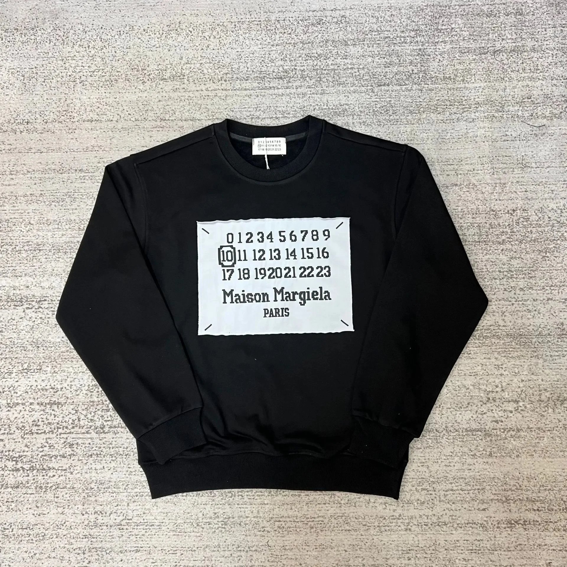 Maison Margiela Graphic crewneck sweatshirts and rib-knit sweaters — 27 black