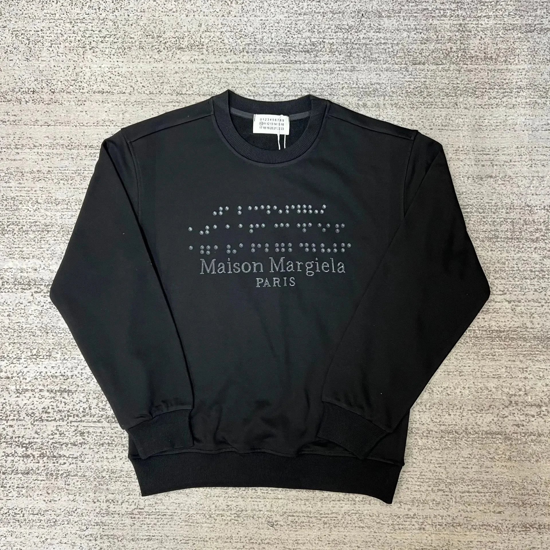 Maison Margiela Graphic crewneck sweatshirts and rib-knit sweaters — 32 black