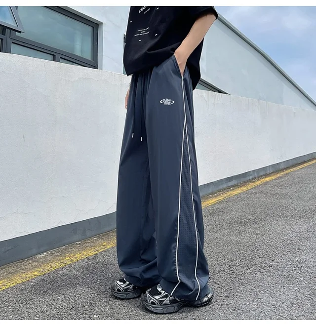 Men's Summer Laser-Punched Loose Ice Silk Trousers Detail