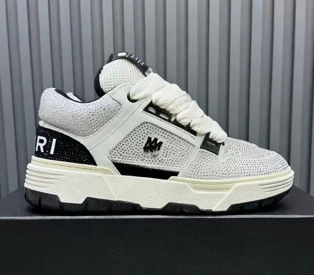 AMIRI Sneakers Low-top lace-up with textured panels and chunky sole — AM black and white diamonds