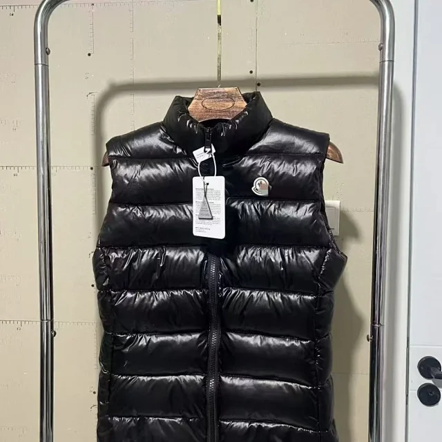 Moncler Vests Quilted puffer vest with detachable hood product detail image 1