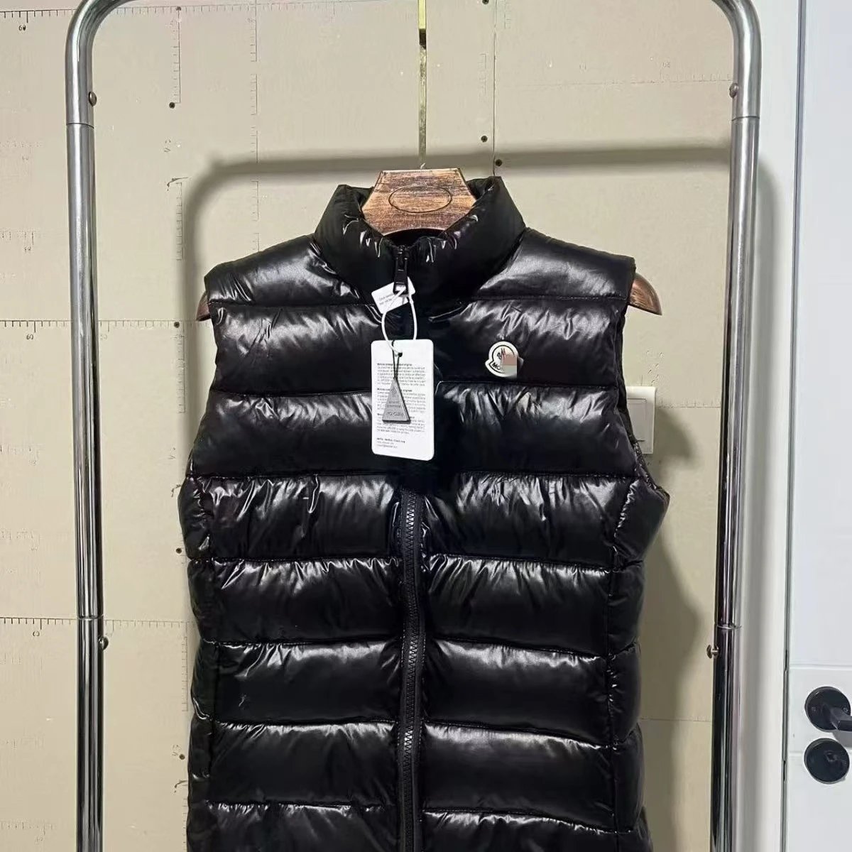 Moncler Vests Quilted puffer vest with detachable hood — Mongolian-style vest, black
