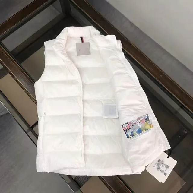 Moncler Vests Quilted puffer vest with detachable hood product detail image 11