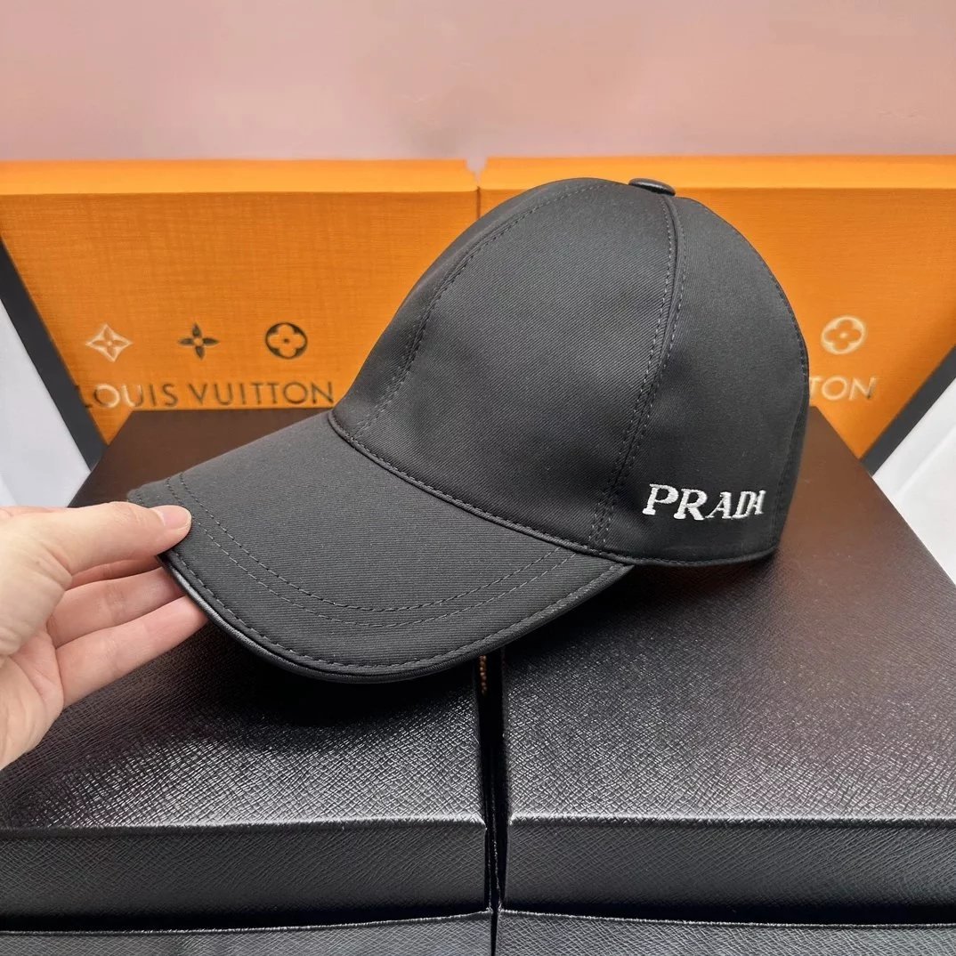 Prada Hats Embroidered baseball cap with triangle plaque — 38