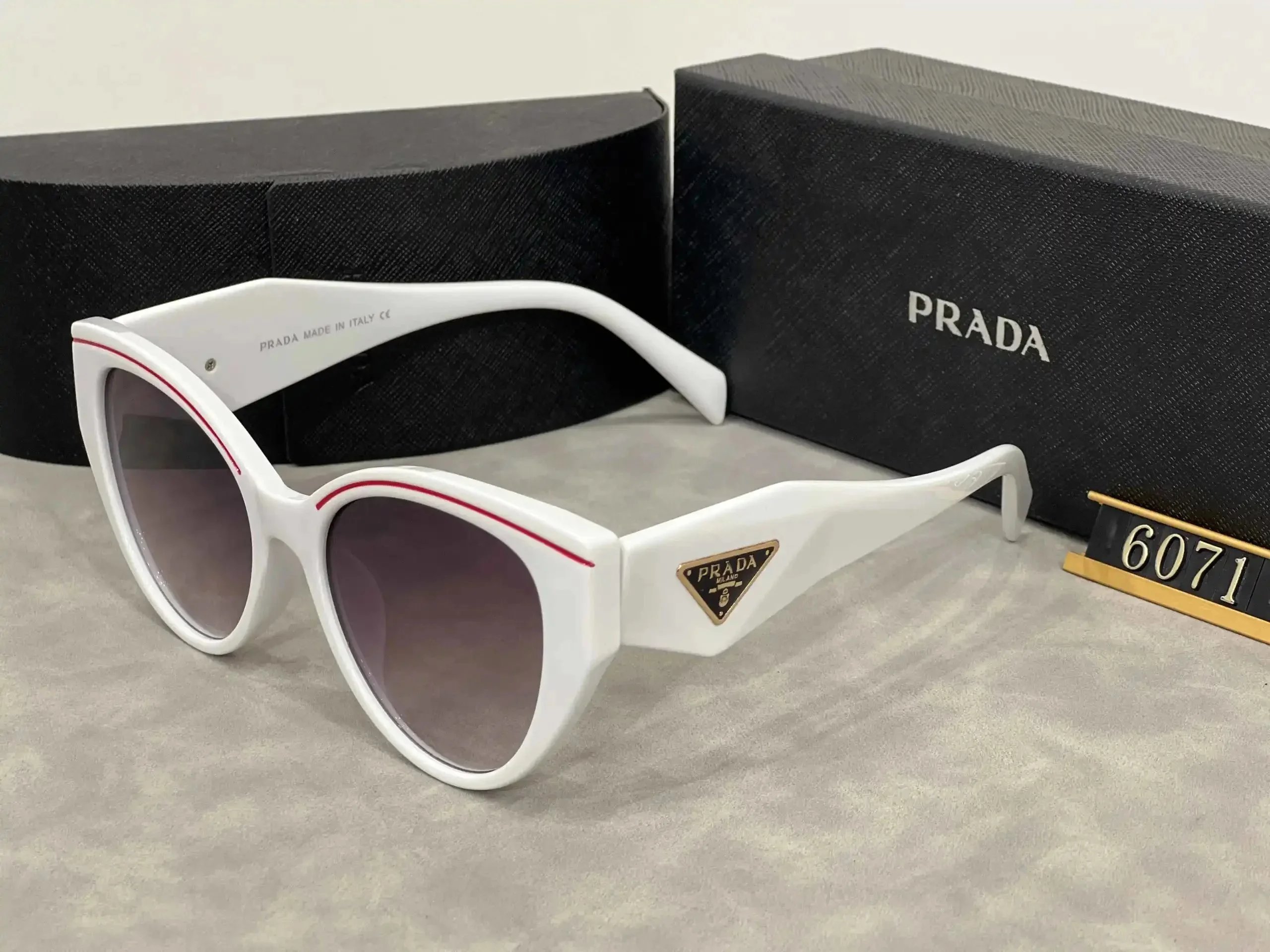 Prada Eyewear Sunglasses — 30