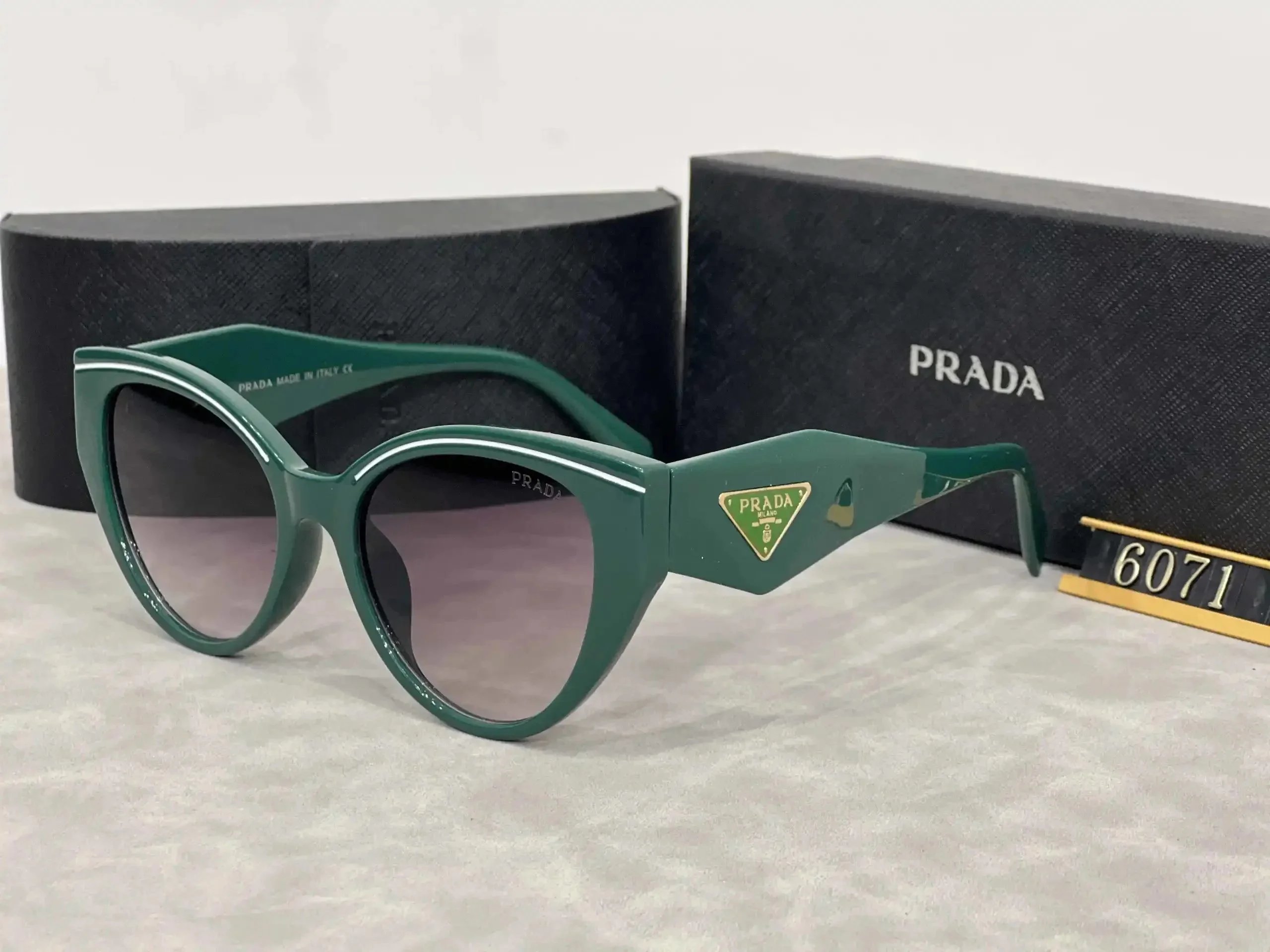 Prada Eyewear Sunglasses — 32