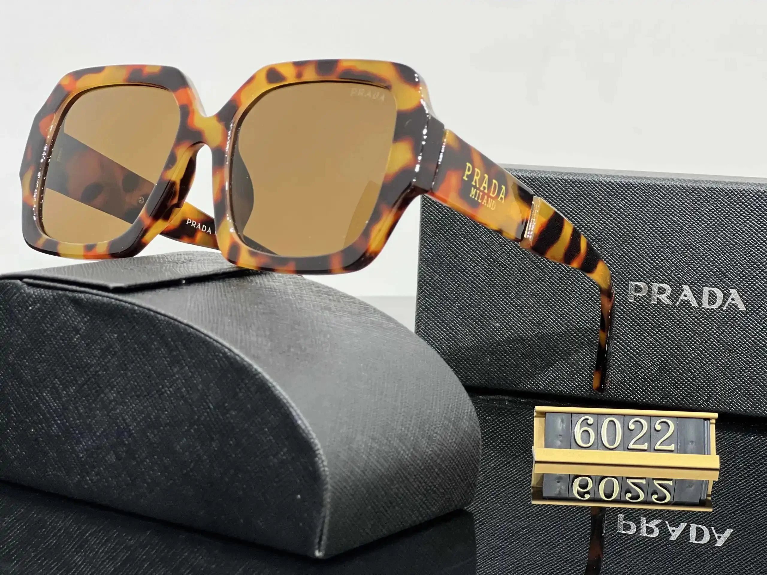 Prada Eyewear Sunglasses — 38