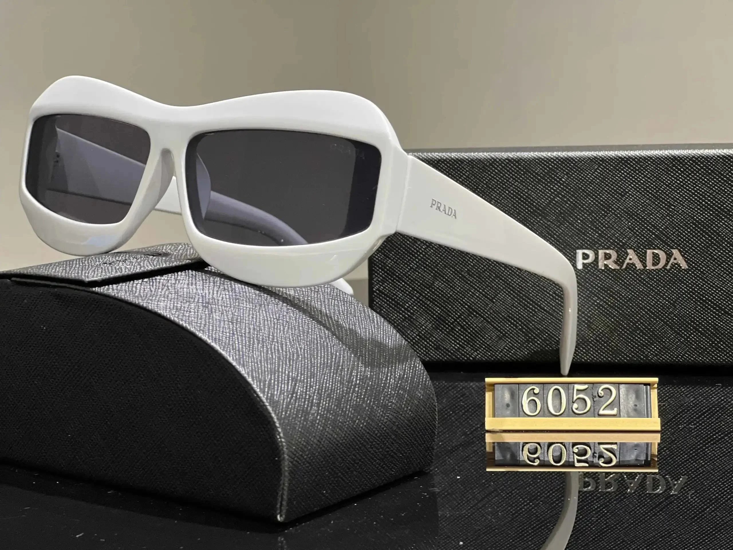 Prada Eyewear Sunglasses — 33