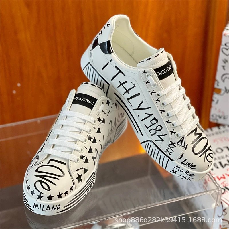 Dolce & Gabbana Sneakers Graffiti embellished low-top — White 10 female code
