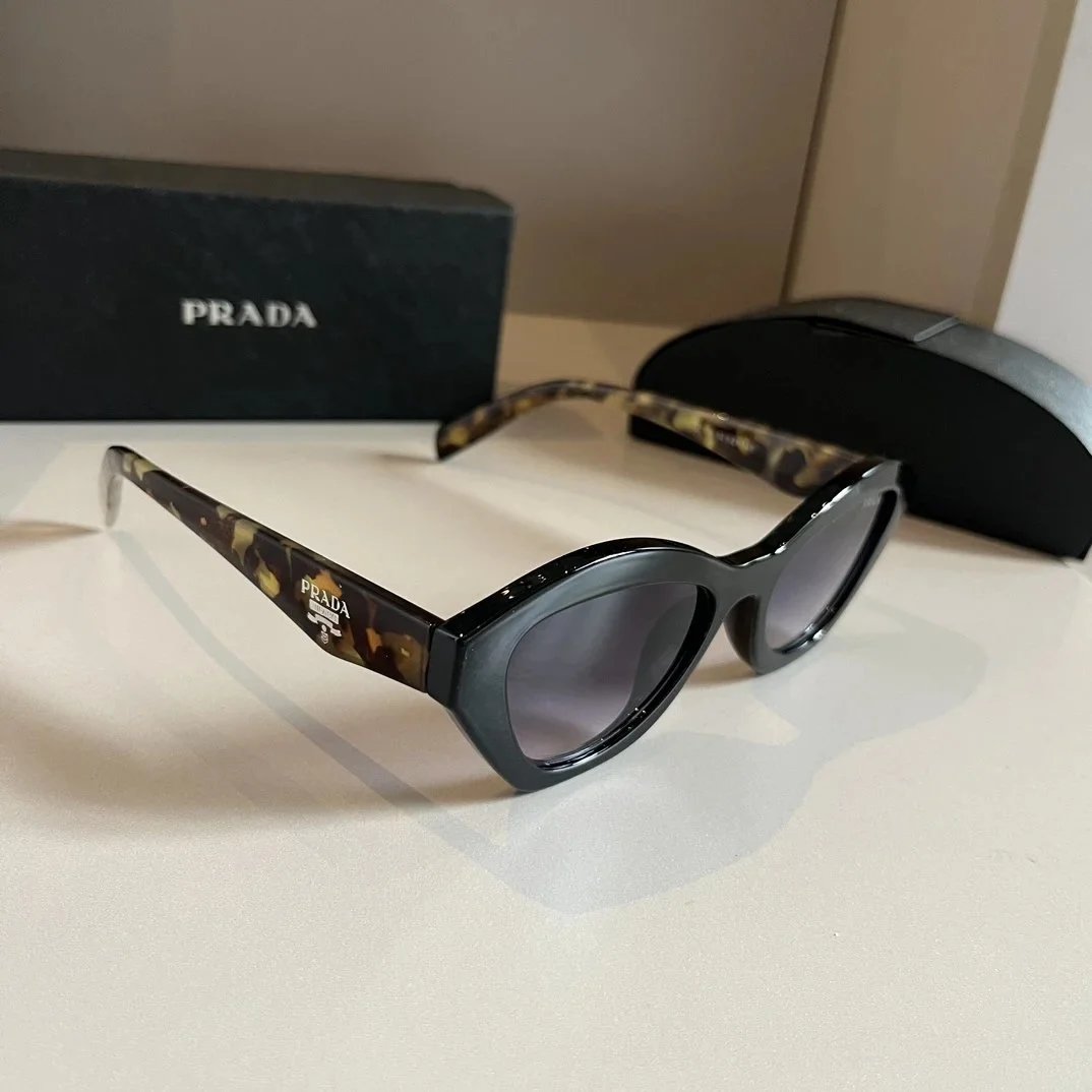 Prada Eyewear Assorted sunglasses and optical frames — 33