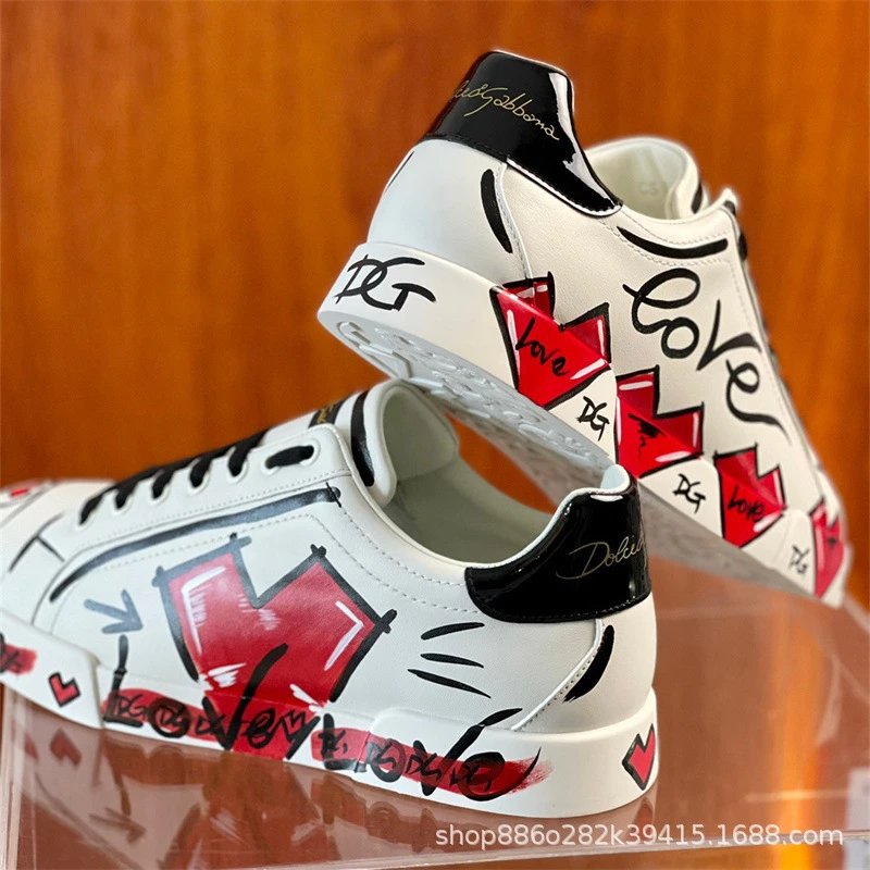 Dolce & Gabbana Sneakers Graffiti embellished low-top — milky white