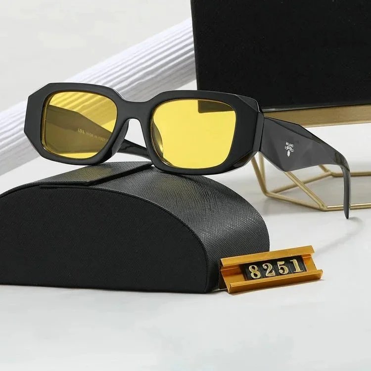Miu Eyewear Logo-embellished sunglasses — PRADA gold