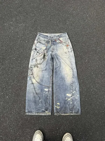 Design Wide-Leg Light Wash Jeans - 10
