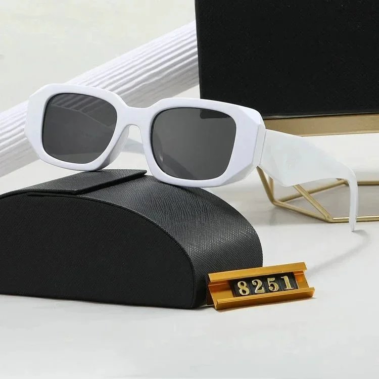 Miu Eyewear Logo-embellished sunglasses — Prada white