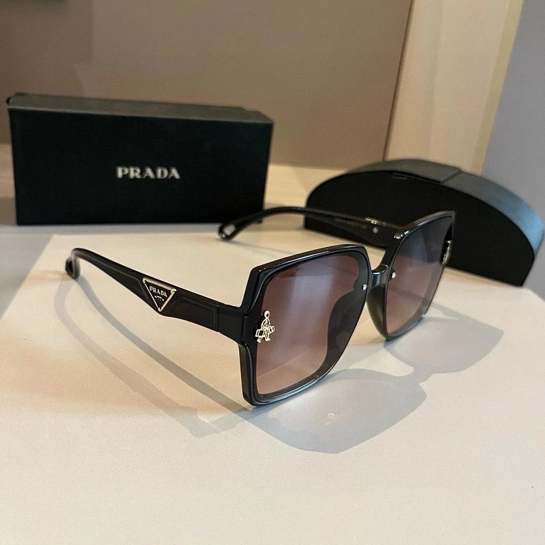 Prada Eyewear Assorted sunglasses and optical frames — 35
