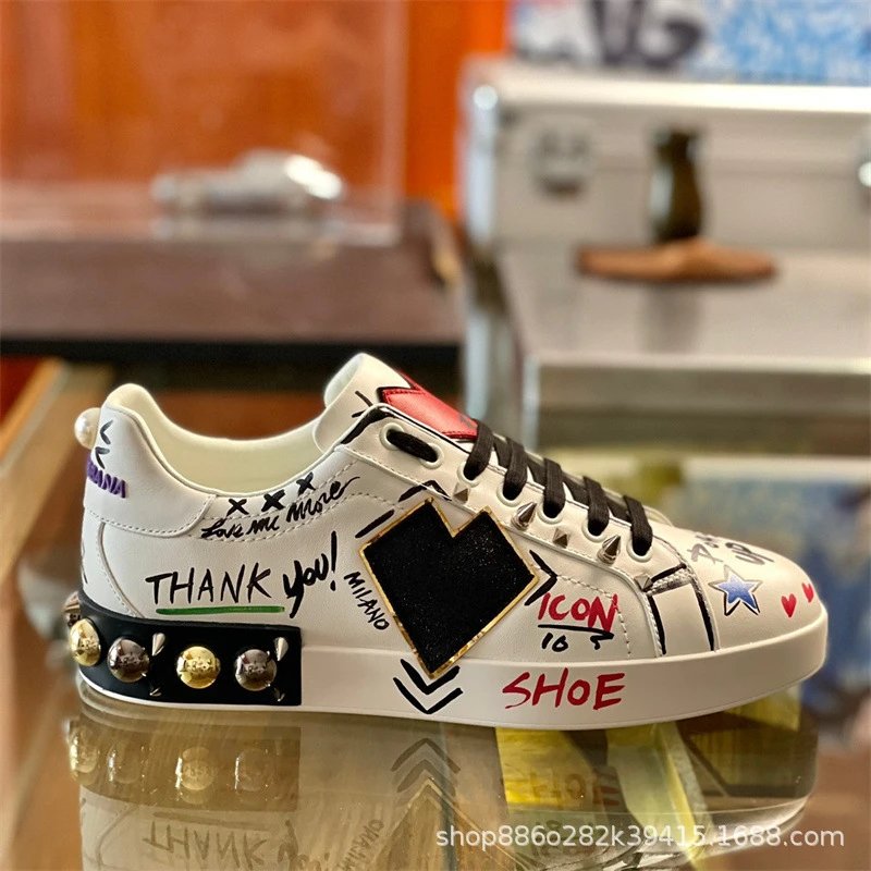Dolce & Gabbana Sneakers Graffiti embellished low-top — Black and white graffiti