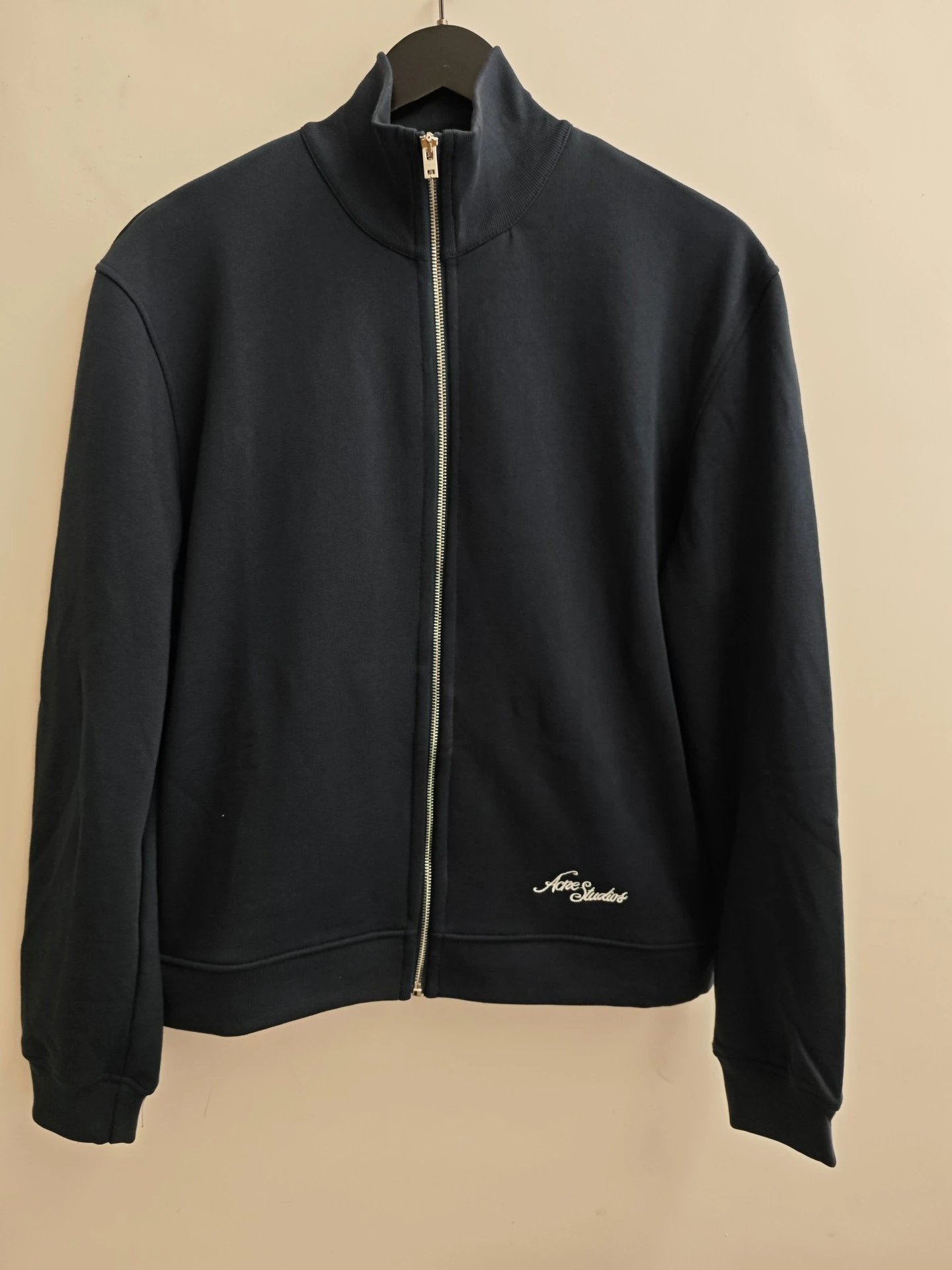 Acne Studios Jackets Stockholm 1996 logo-embroidered jacket — Embroidered logo stand-collar zip-up jacket in black