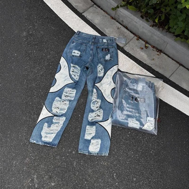 Ripped patchwork jeans