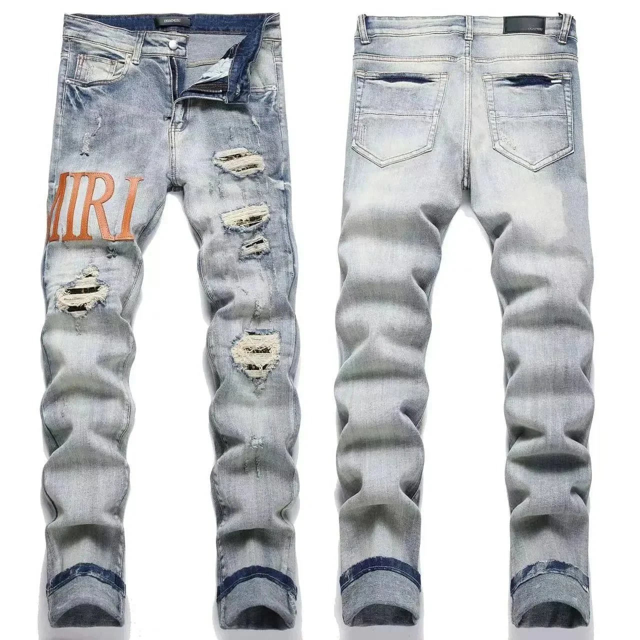 AMIRI Distressed Light Wash Denim Jeans